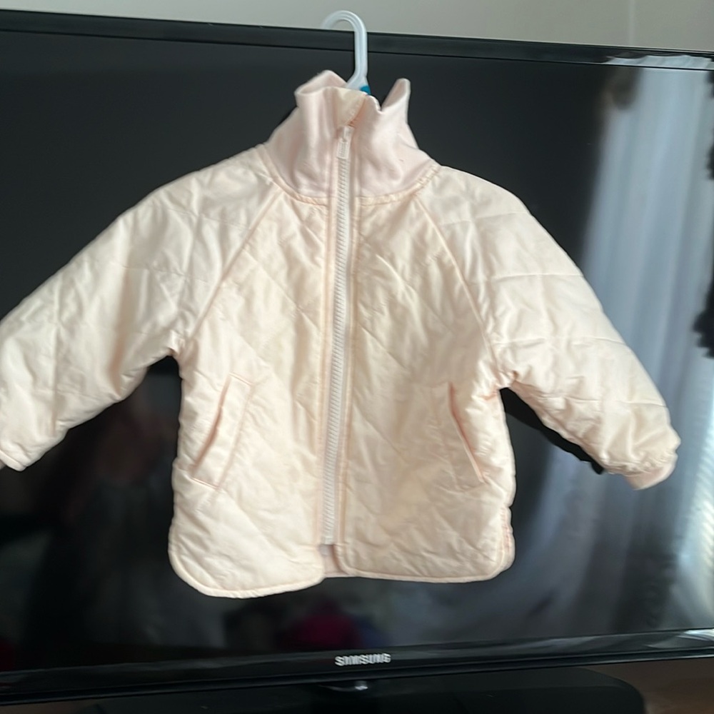 Baby girl jacket by Gerber. Color light pink.